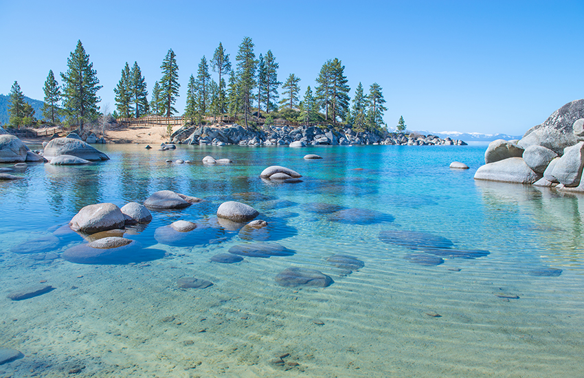 Beautiful blue clear water on the shore of the lake Tahoe