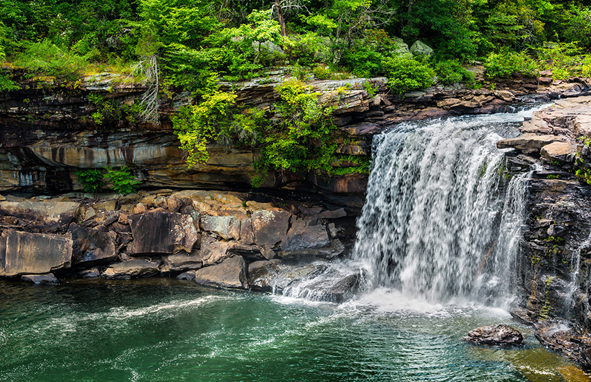 a waterfall over a river in Little River Canyon National Preserve, Alabama